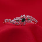 Flowing Wave Silver-Tone Bracelet with Micro-Stone Embellishment - Green Centerpiece (Free Size)