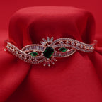 Flowing Wave Silver-Tone Bracelet with Micro-Stone Embellishment - Green Centerpiece (Free Size)