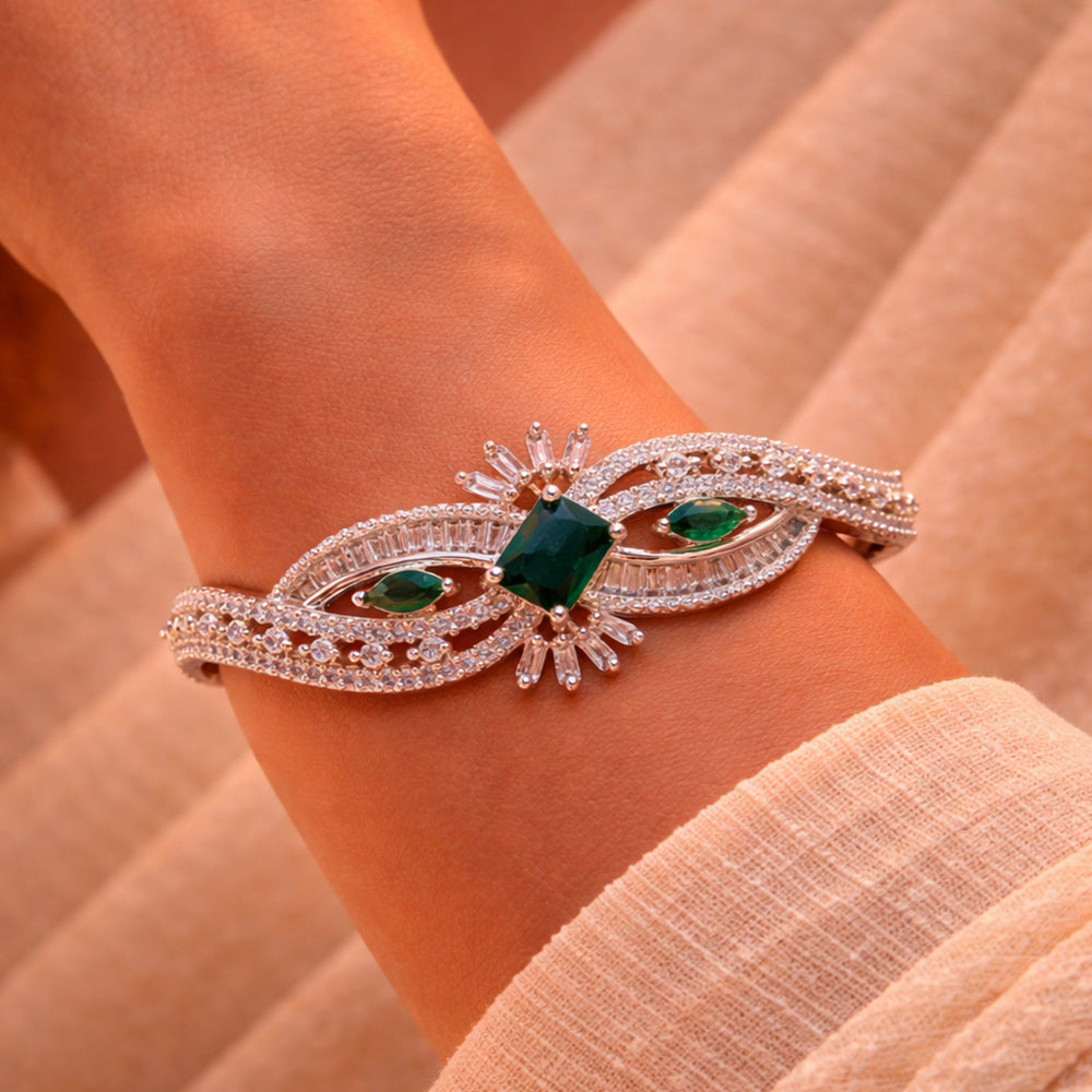 Flowing Wave Silver-Tone Bracelet with Micro-Stone Embellishment - Green Centerpiece (Free Size)