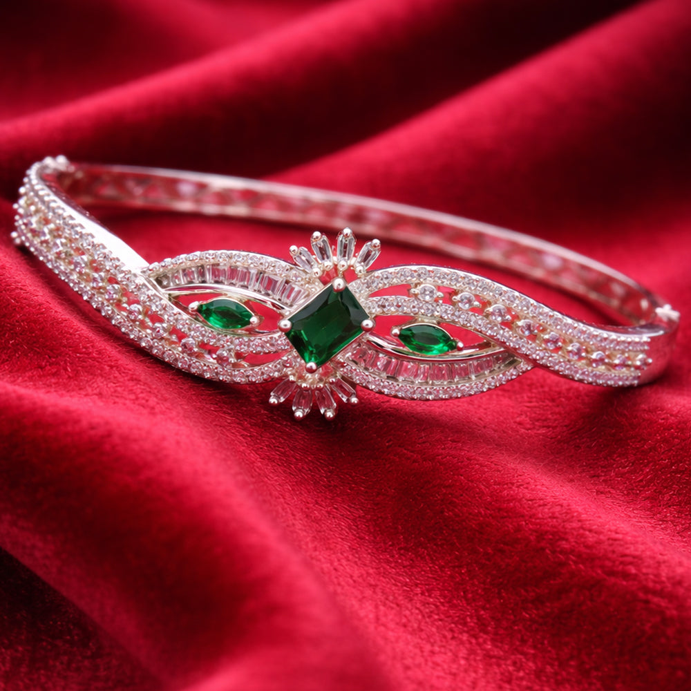 Flowing Wave Silver-Tone Bracelet with Micro-Stone Embellishment - Green Centerpiece (Free Size)