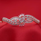 Flowing Wave Silver-Tone Bracelet with Micro-Stone Embellishment - Mint Centerpiece (Free Size)