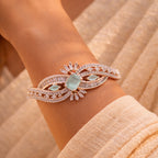 Flowing Wave Silver-Tone Bracelet with Micro-Stone Embellishment - Mint Centerpiece (Free Size)