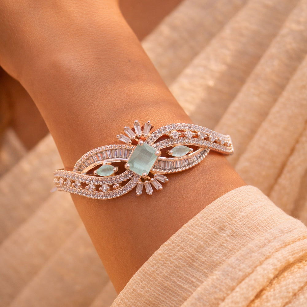 Flowing Wave Silver-Tone Bracelet with Micro-Stone Embellishment - Mint Centerpiece (Free Size)