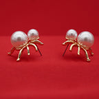 Gold-Tone Pearl Designer Stud Earrings