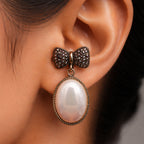 Gold Tone Bow Pearl Drop Earrings
