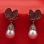 Gold Tone Crystal Accent Butterfly Pearl Drop Earrings