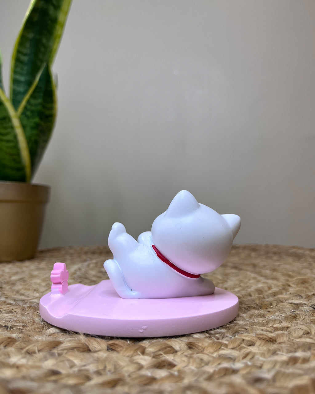 Kawaii Lucky Cat Phone Stand – Serene Relaxing Pose with Cherry Blossom Paw Base