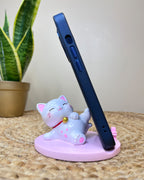 Kawaii Lucky Cat Phone Stand – Serene Relaxing Pose with Cherry Blossom Paw Base