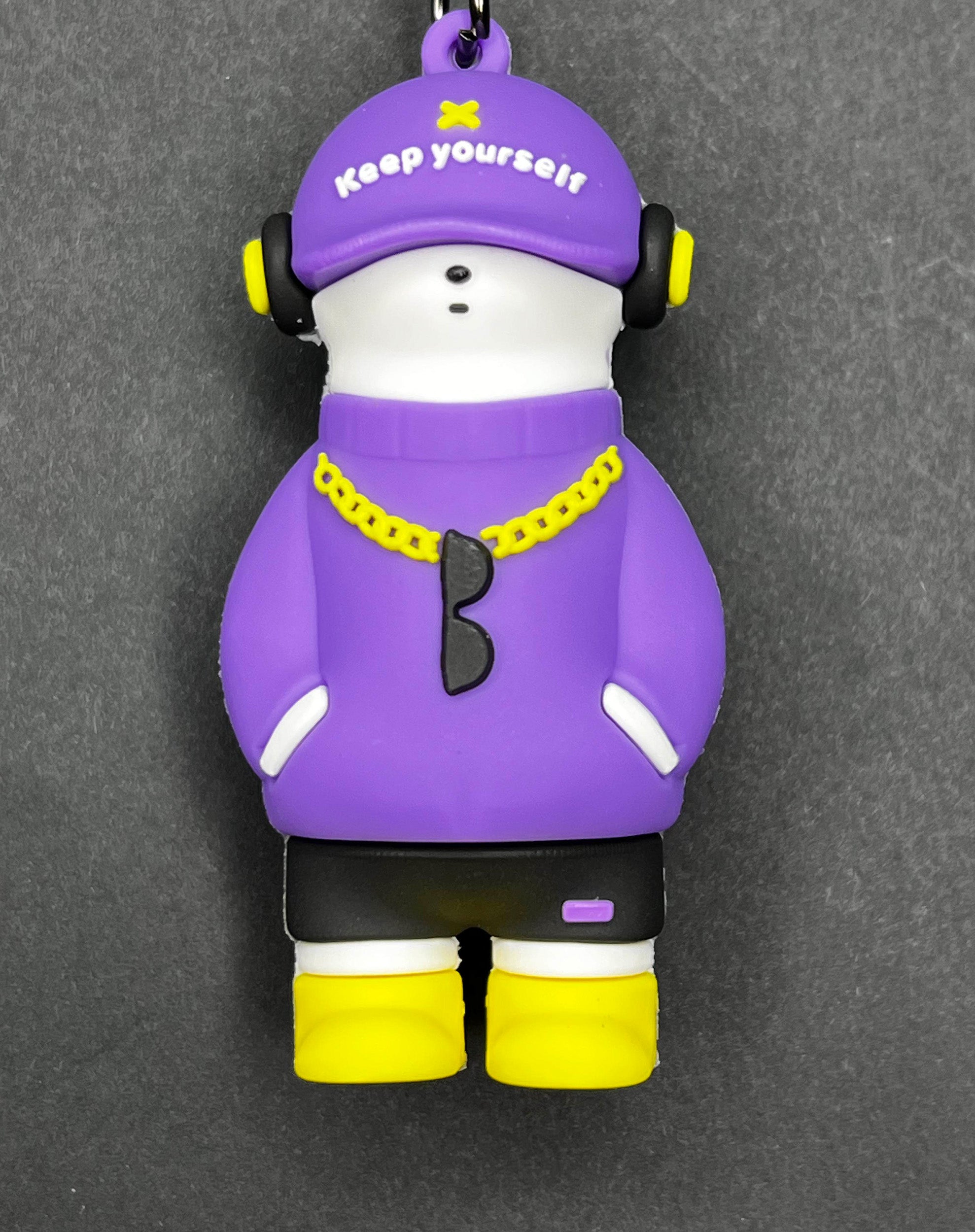 🧢 Keep Yourself Keychain – Street Style Violet Hoodie Boy Charm