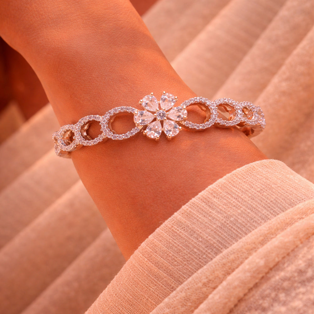 Structured Gold-Tone Bracelet with Floral Motif Center and Diamond-Lined Circles (Free Size)