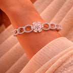 Structured Gold-Tone Bracelet with Floral Motif Center and Diamond-Lined Circles (Free Size)
