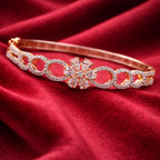 Structured Gold-Tone Bracelet with Floral Motif Center and Diamond-Lined Circles (Free Size)
