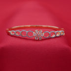 Structured Gold-Tone Bracelet with Floral Motif Center and Diamond-Lined Circles (Free Size)